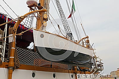The three masted Palinuro, a historic Italian Navy training barquentine, moored in the Gaeta port. Editorial Stock Photo